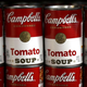 Cans of Campbell's Tomato Soup on store shelves